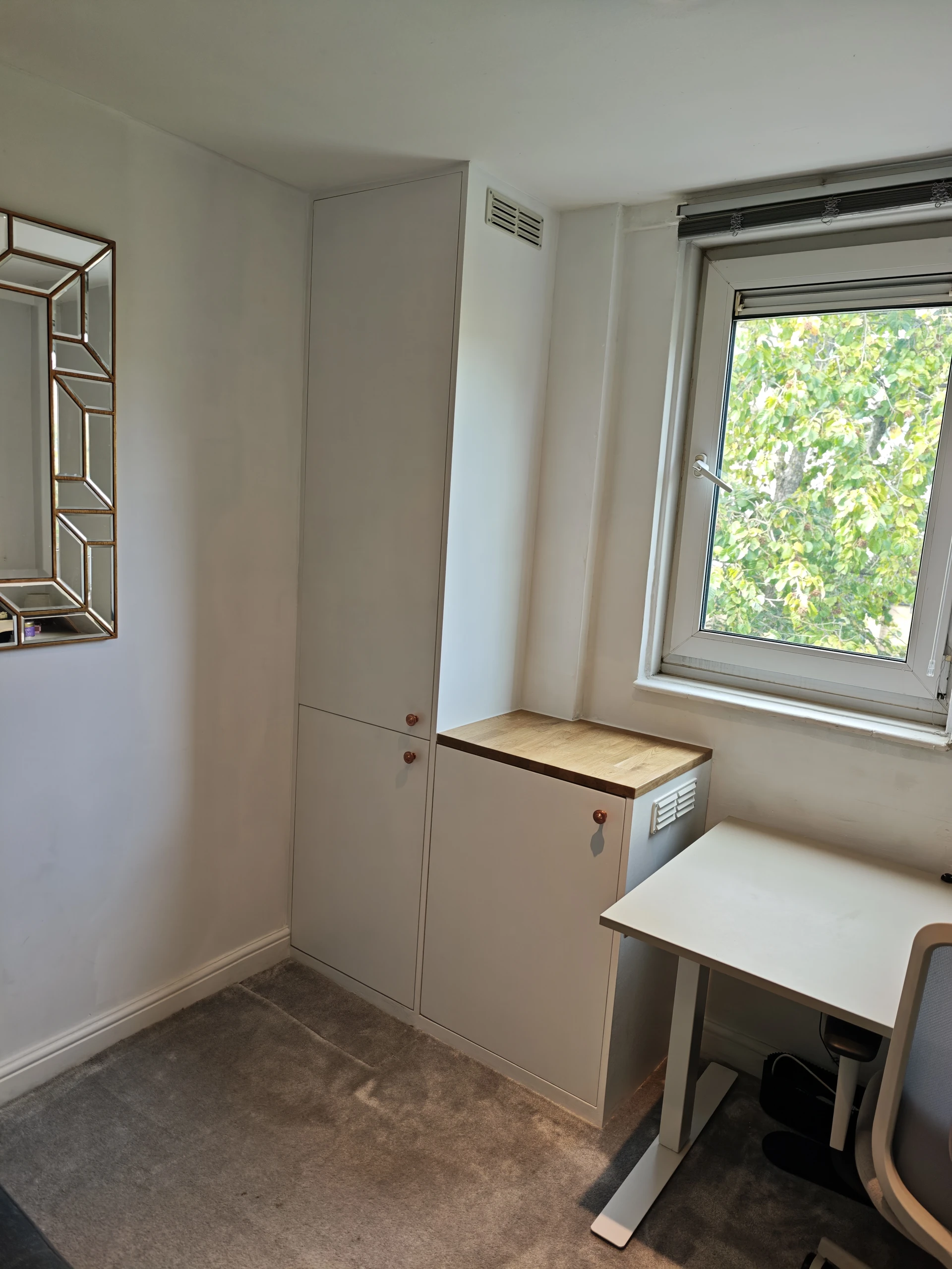 London N19 — Fitted enclosure beside the window