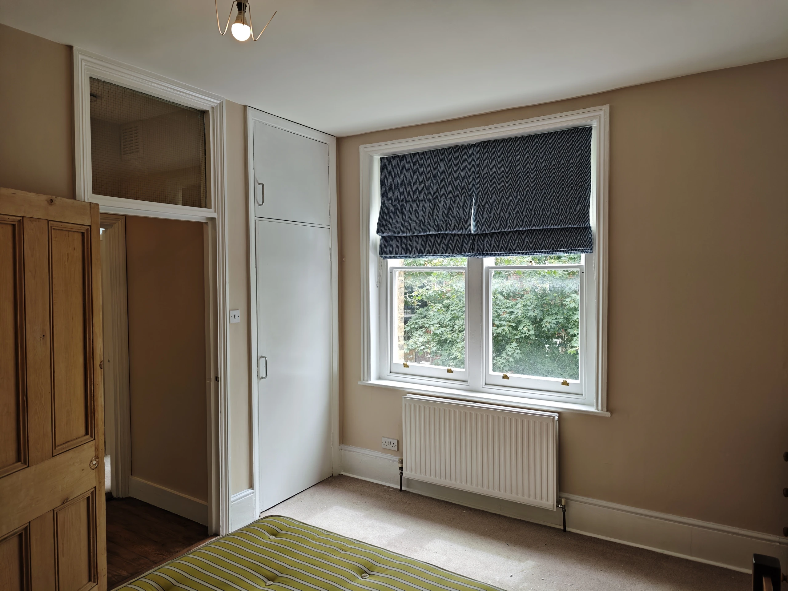 London W9 — Decorated room and fitted storage